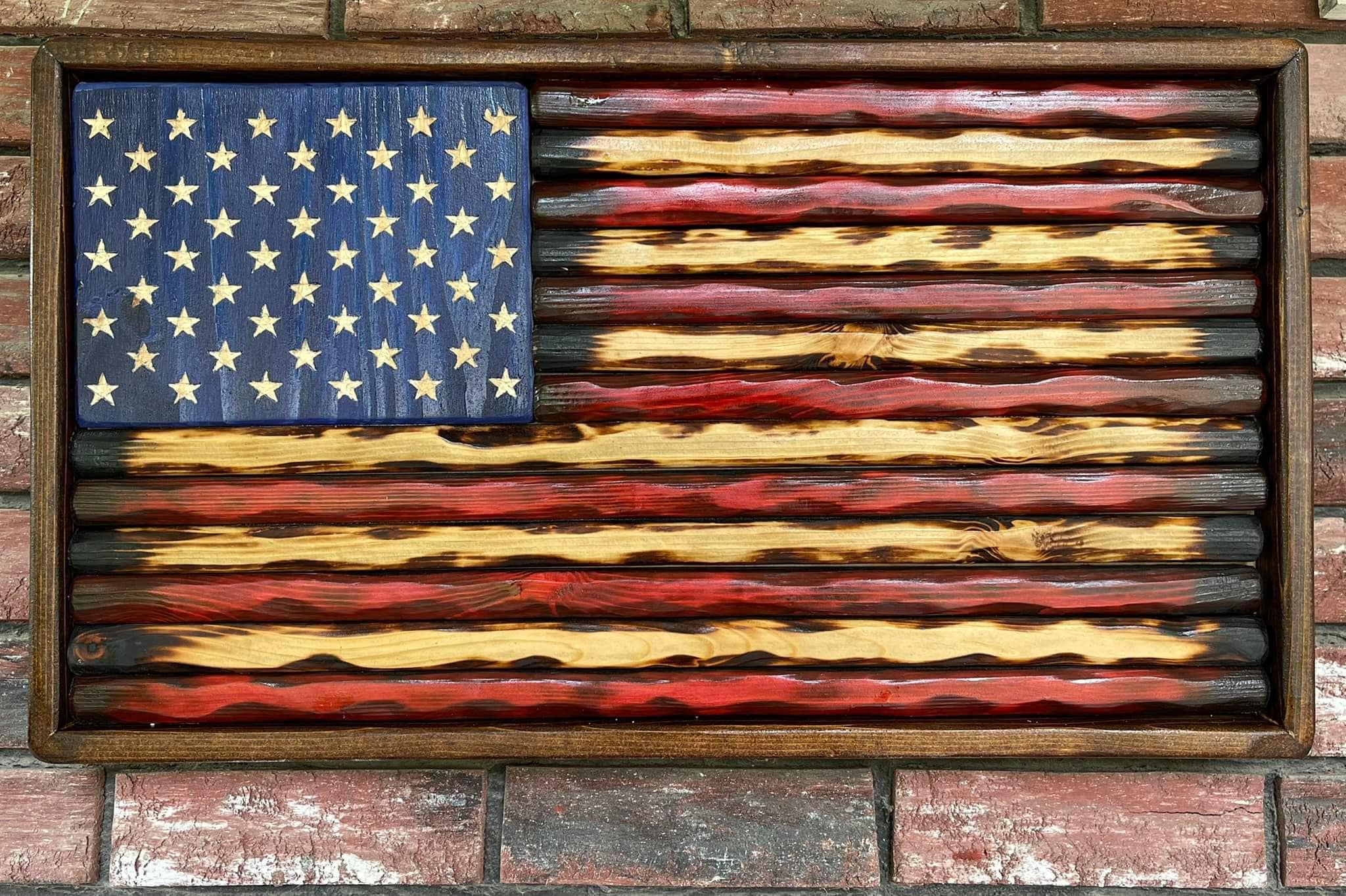 Close-up of handmade wooden American flag showing detailed craftsmanship